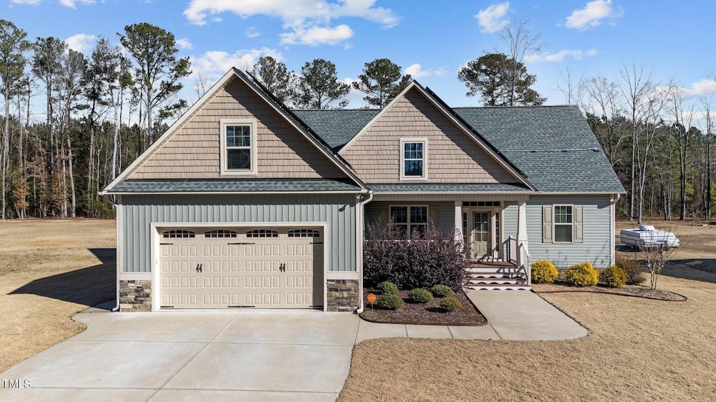 craftsman house with a garage