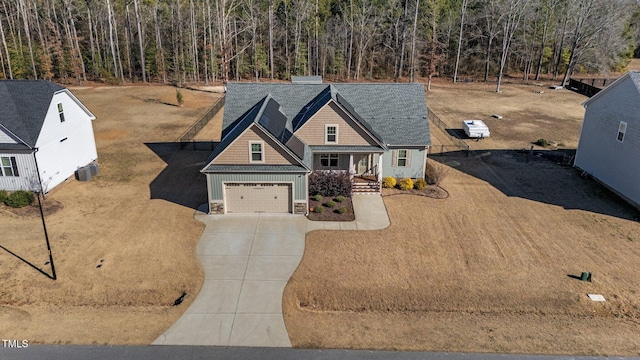 view of front facade featuring a garage and a porch