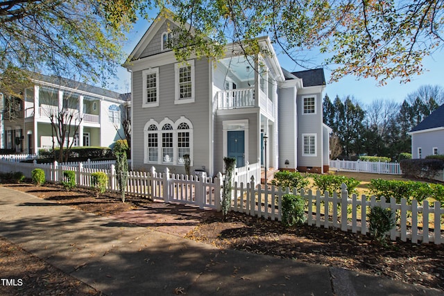 view of front of home featuring a balcony