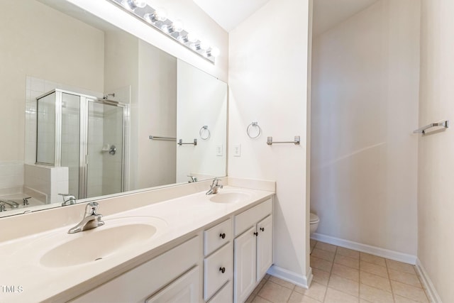 full bathroom featuring tile patterned floors, toilet, vanity, and plus walk in shower