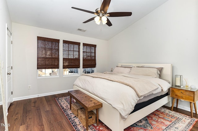 bedroom featuring ceiling fan, wood-type flooring, and lofted ceiling