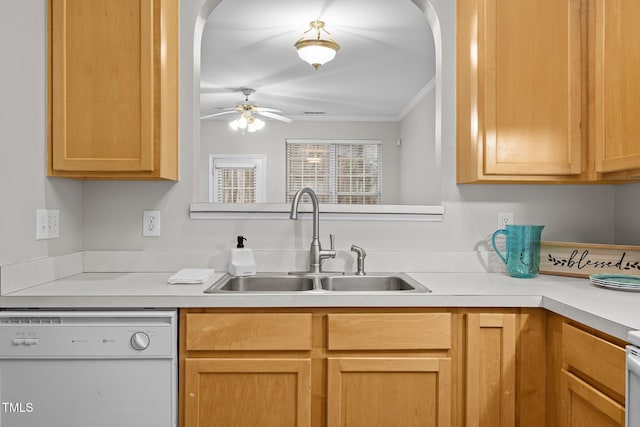 kitchen with sink, light brown cabinets, ornamental molding, white dishwasher, and ceiling fan