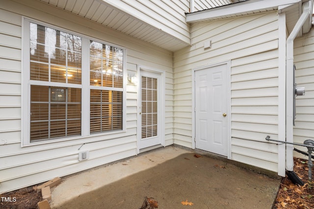 doorway to property featuring a patio area