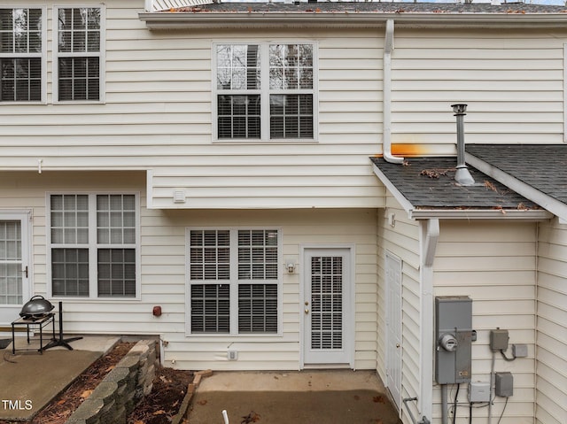 back of property featuring a patio area