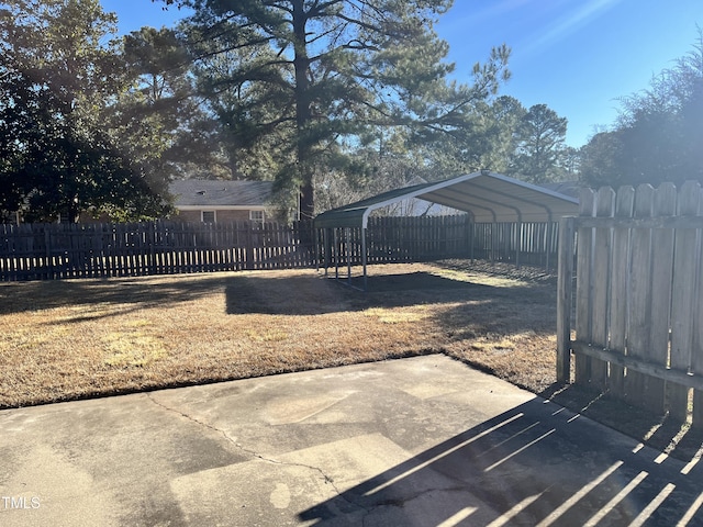 view of yard with a carport