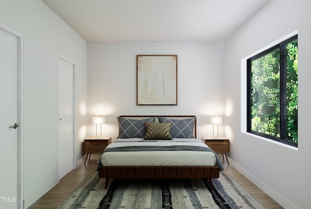 bedroom with wood-type flooring