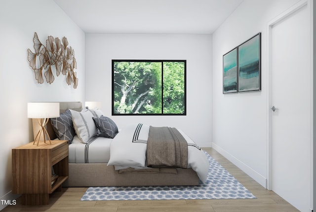 bedroom featuring light wood-type flooring