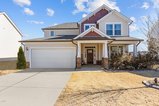 craftsman-style house with covered porch and a garage