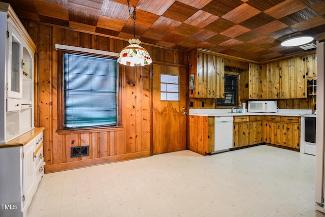 kitchen featuring wood ceiling, wood walls, white appliances, and pendant lighting