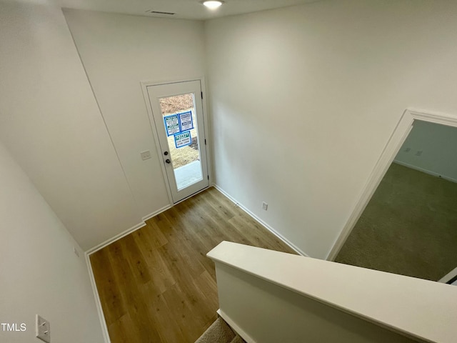 entrance foyer with hardwood / wood-style floors