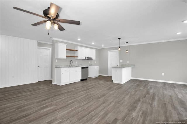 kitchen with white cabinets, dark wood-type flooring, sink, hanging light fixtures, and ceiling fan