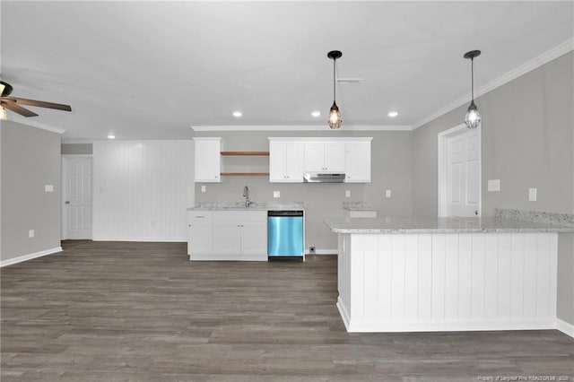 kitchen with dark hardwood / wood-style flooring, stainless steel dishwasher, white cabinets, and hanging light fixtures