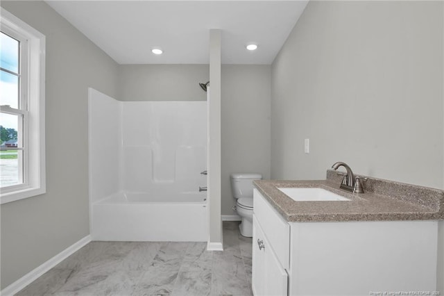 full bathroom featuring toilet,  shower combination, and vanity