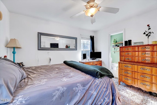 carpeted bedroom with a closet, ceiling fan, and connected bathroom