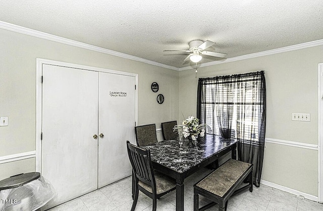 dining space featuring crown molding, a textured ceiling, and ceiling fan