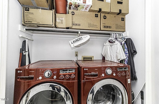 laundry area with washer and dryer