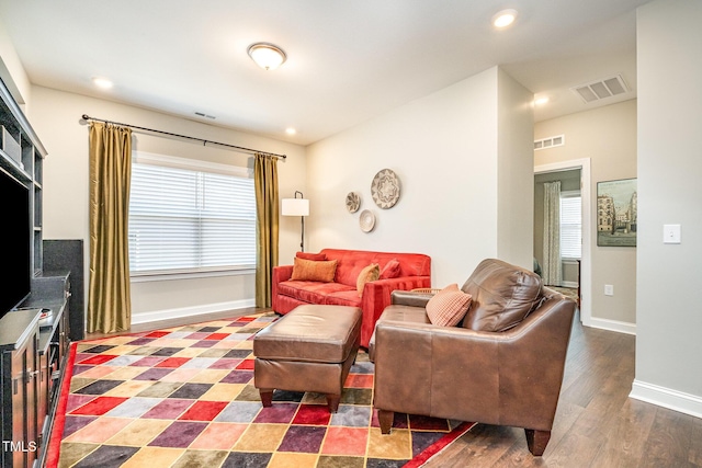 living room featuring dark hardwood / wood-style floors