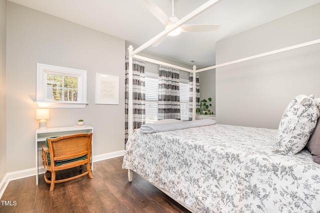 bedroom featuring dark hardwood / wood-style floors and ceiling fan