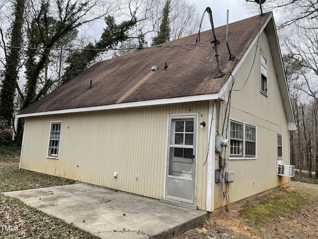 back of house with a patio area