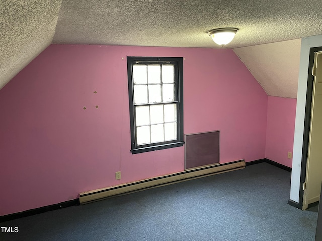 bonus room featuring vaulted ceiling, carpet flooring, a textured ceiling, and baseboard heating