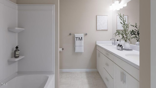 bathroom featuring a bath and vanity