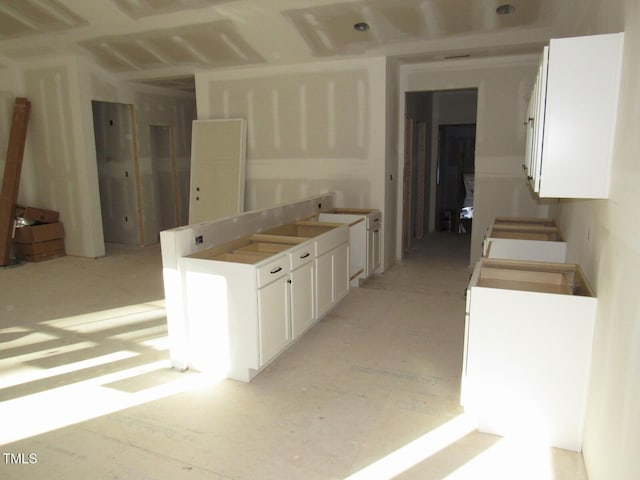 kitchen with white cabinetry