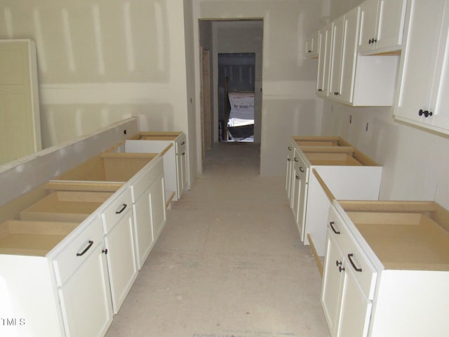 kitchen featuring white cabinetry