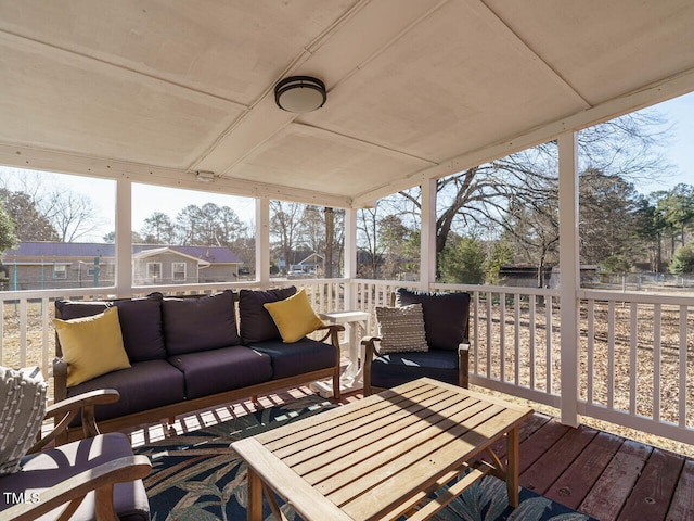 wooden deck with an outdoor hangout area