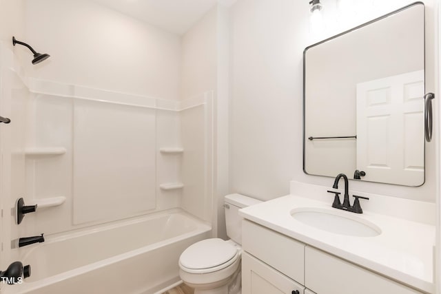 full bathroom with toilet, tub / shower combination, and vanity