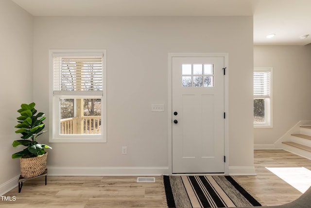 foyer featuring light hardwood / wood-style floors