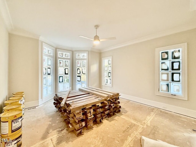 interior space featuring ceiling fan and ornamental molding