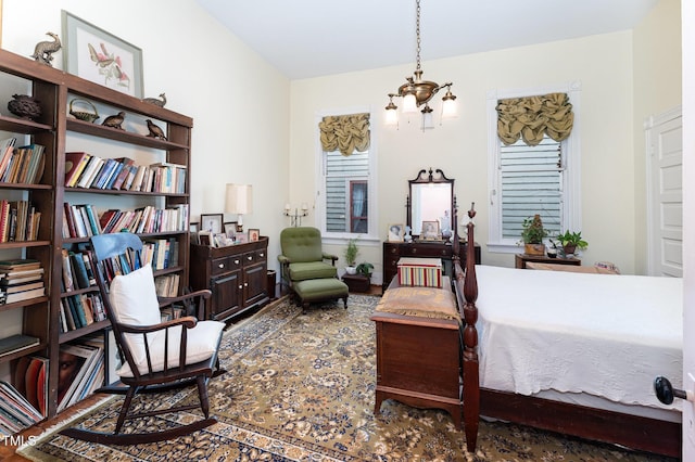 bedroom with an inviting chandelier