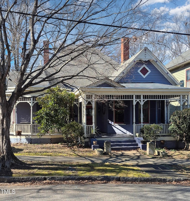 victorian-style house with a porch