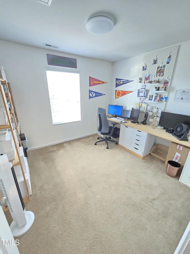 office space featuring light colored carpet