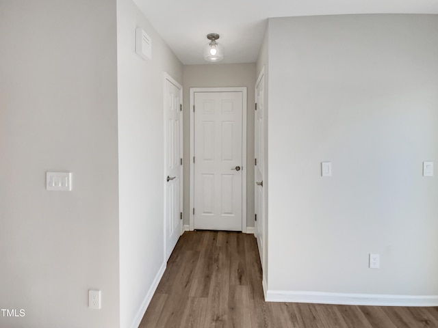 corridor featuring light hardwood / wood-style flooring