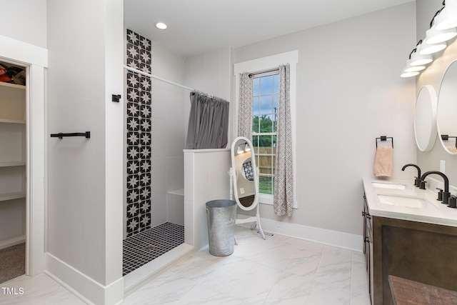 bathroom with vanity and curtained shower