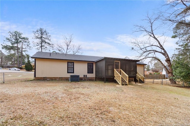 back of property featuring cooling unit and a sunroom