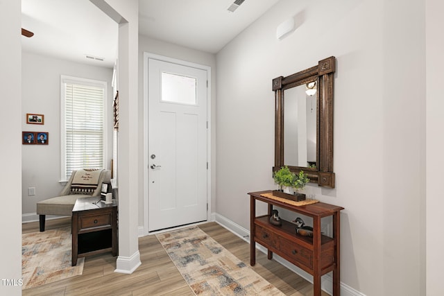 entrance foyer featuring light hardwood / wood-style floors