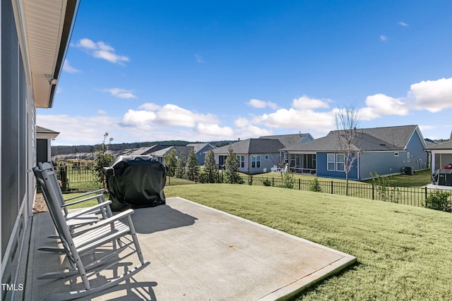 view of patio featuring a grill