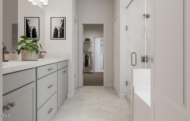 bathroom featuring vanity and independent shower and bath