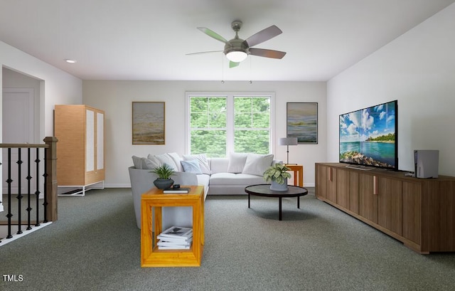 living room with ceiling fan and carpet flooring