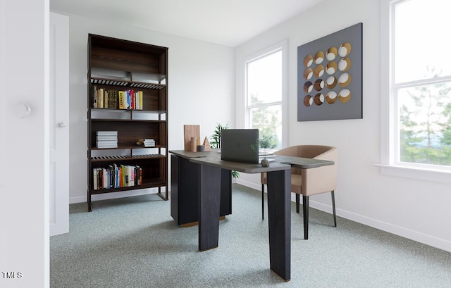 office featuring a healthy amount of sunlight and light colored carpet