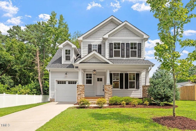 2905 Cammie St, Durham, NC 27705 - craftsman house with stone siding, a porch, concrete driveway, an attached garage, and a shingled roof