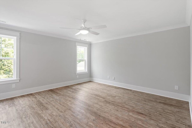 2905 Cammie St, Durham, NC 27705 - empty room with ornamental molding, wood finished floors, and a ceiling fan