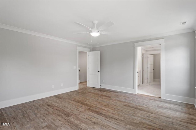 2905 Cammie St, Durham, NC 27705 - unfurnished bedroom with crown molding, wood finished floors, connected bathroom, and a ceiling fan
