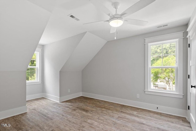 2905 Cammie St, Durham, NC 27705 - additional living space featuring wood finished floors, lofted ceiling, and a ceiling fan