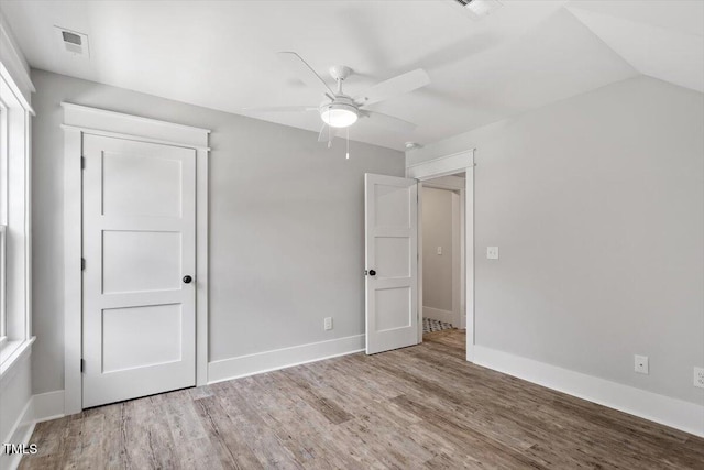 2905 Cammie St, Durham, NC 27705 - unfurnished bedroom with wood finished floors and a ceiling fan