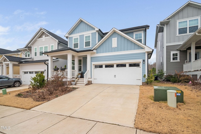 craftsman house with a porch and a garage