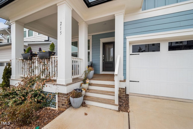 doorway to property featuring a garage