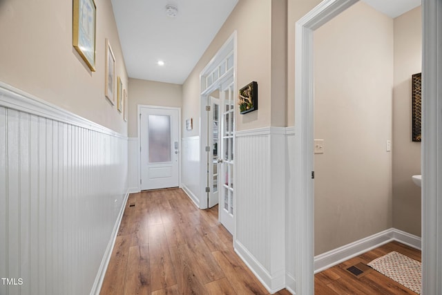 hallway featuring light hardwood / wood-style floors